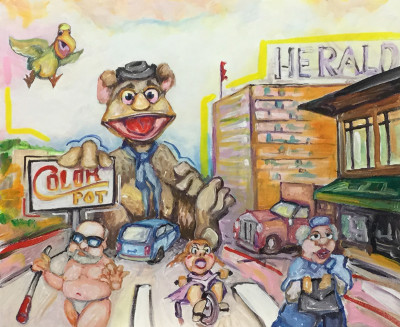 Fozzie Bear sits down and blocks N. State st,  Bellingham WA